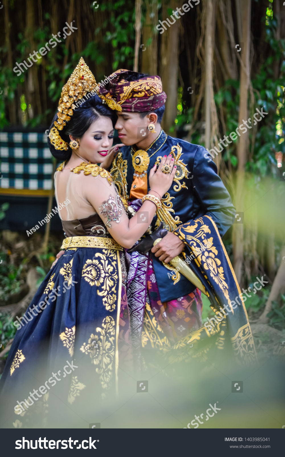 Balinese Couple Using Traditional Balinese Wedding Stock Photo