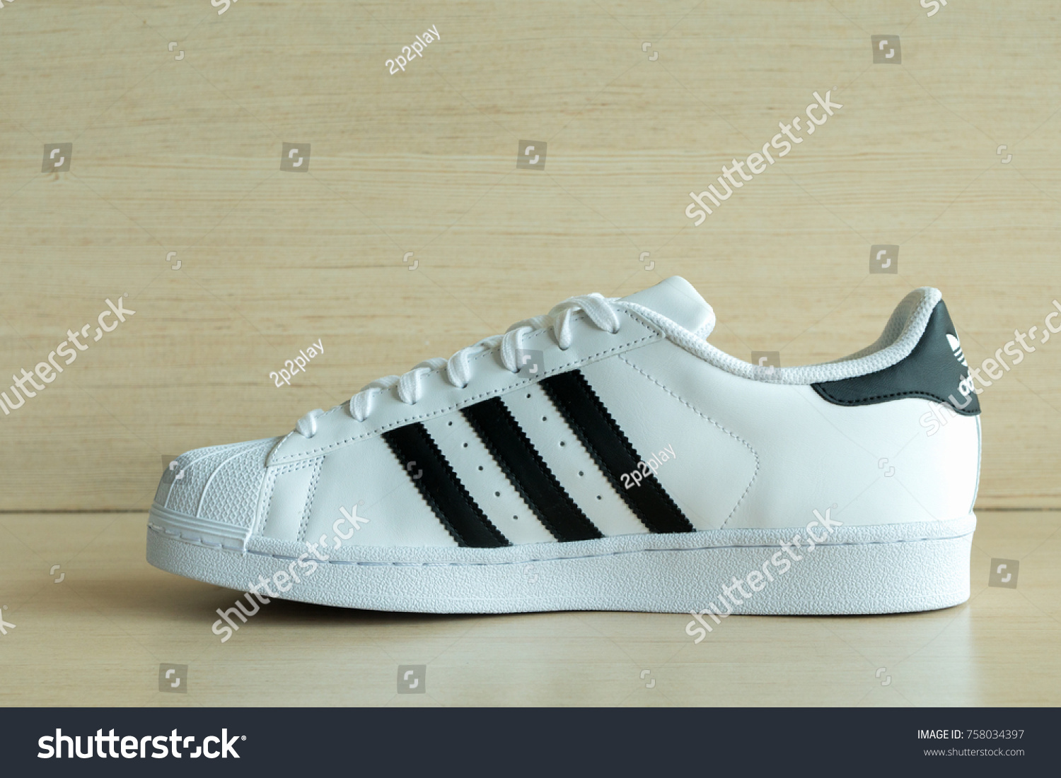 BANGKOK, THAILAND June 25,2016: Adidas superstar shoes on white.. BANGKOK, THAILAND June 25,2016: Adidas superstar shoes on white..