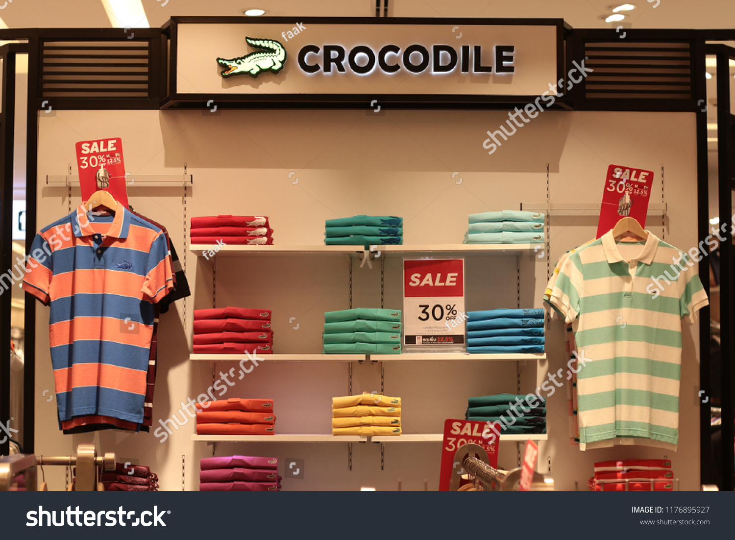 Clothing company with crocodile logo best sale