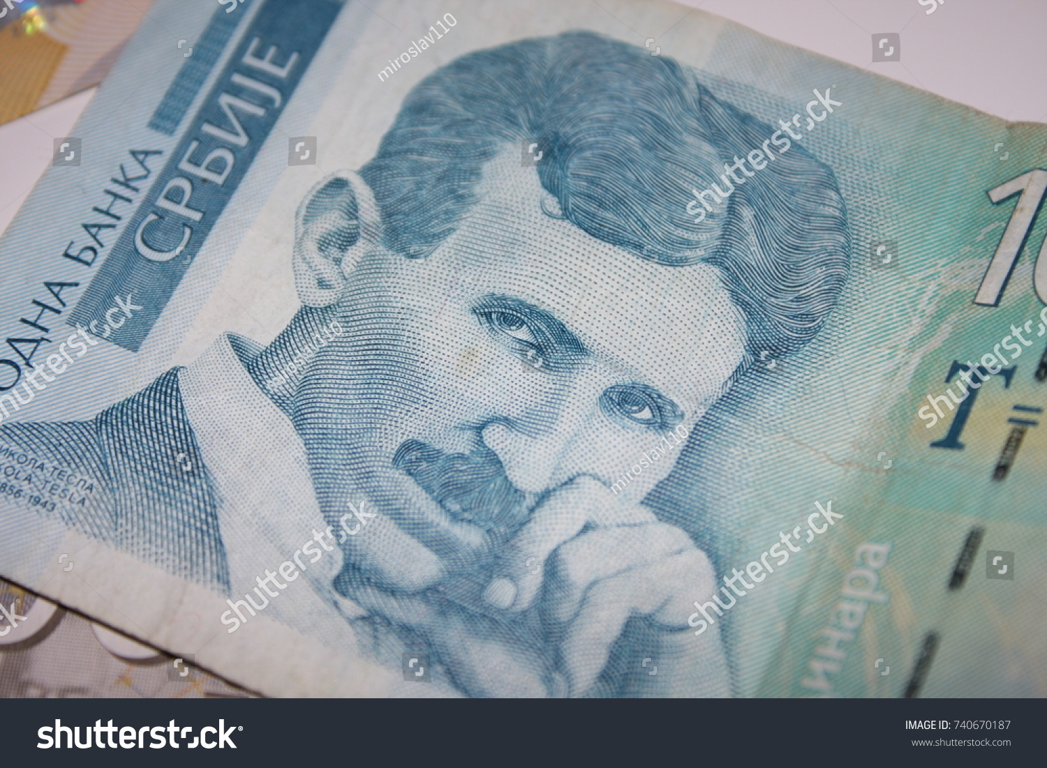 banknote-100-serbian-dinars-rsd-pile-stock-photo-740670187-shutterstock