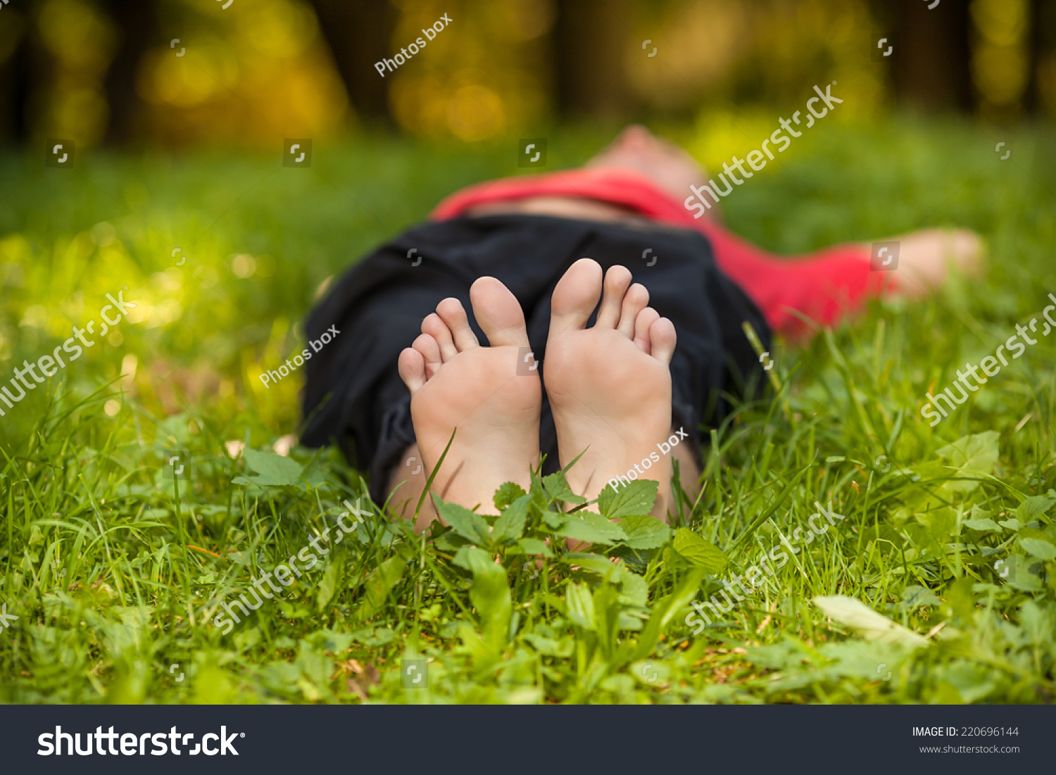 Bare Feet On Green Grass Stock Photo 220696144 Shutterstock   Stock Photo Bare Feet On Green Grass 220696144 