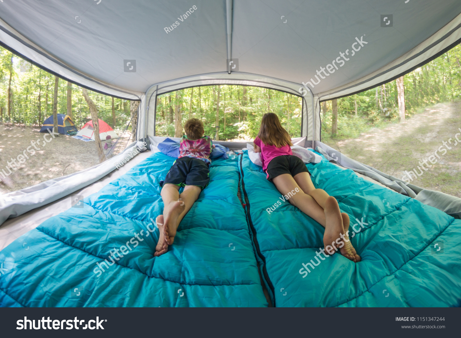 Bare Footed Children Laying On Blue Stock Photo 1151347244 | Shutterstock