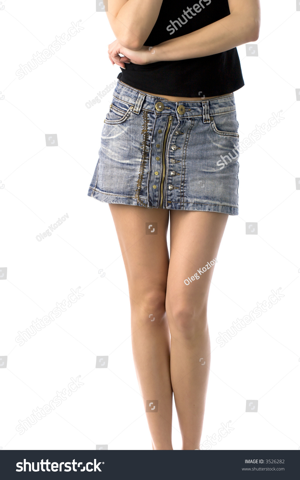 Bare Legs Of Girl In Short Jeans Skirt, Isolated On White Stock Photo ...