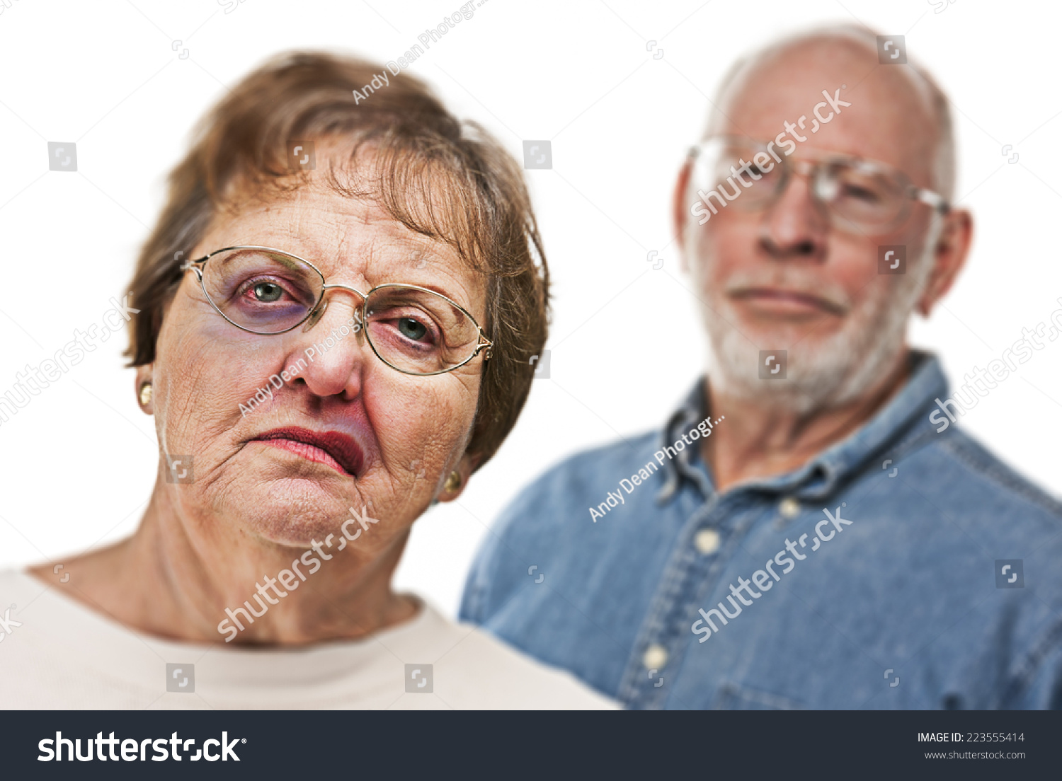 battered-scared-woman-ominous-angry-man-stock-photo-223555414