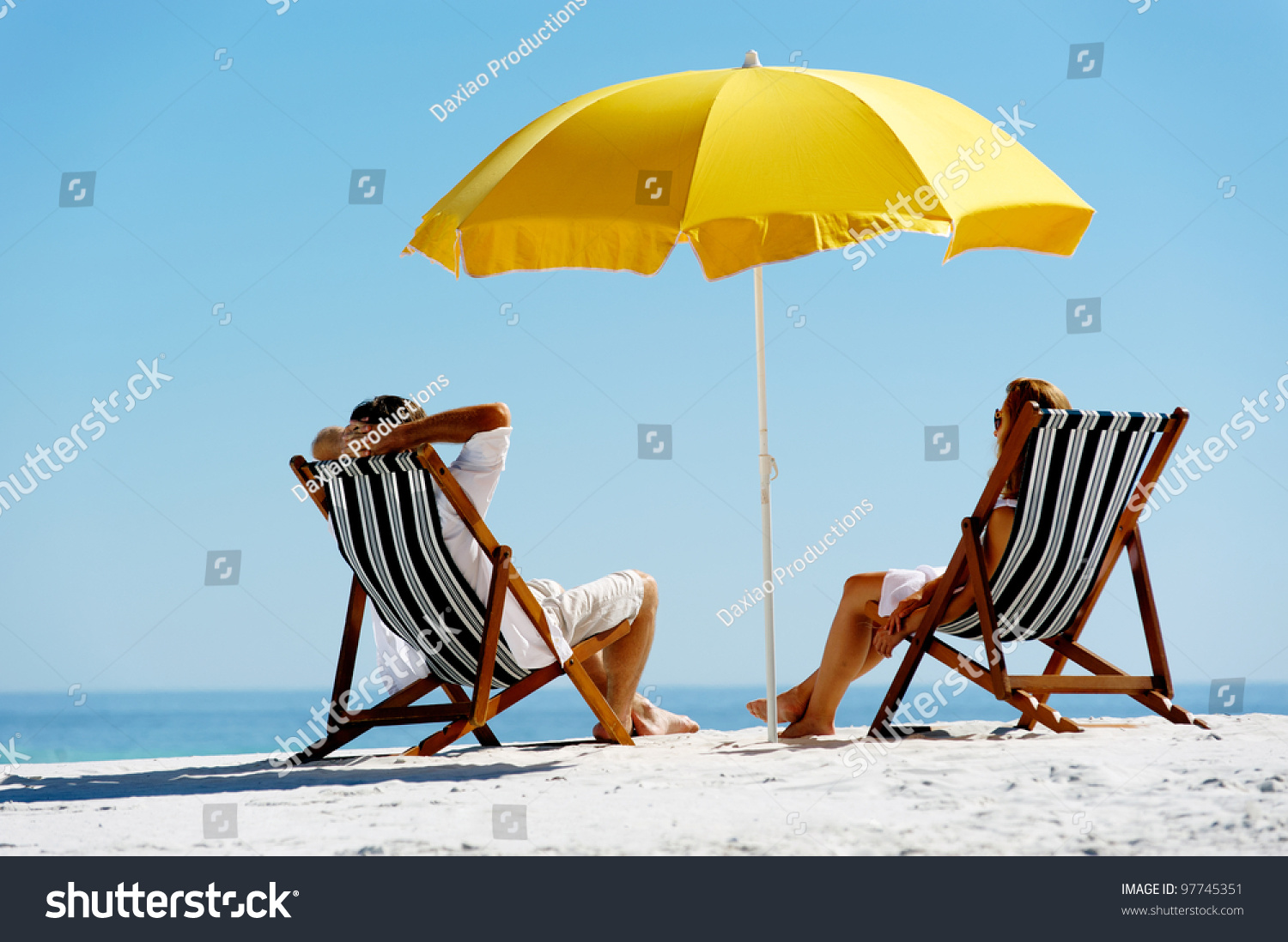 3,126 Sitting under the an umbrella Stock Photos, Images & Photography ...