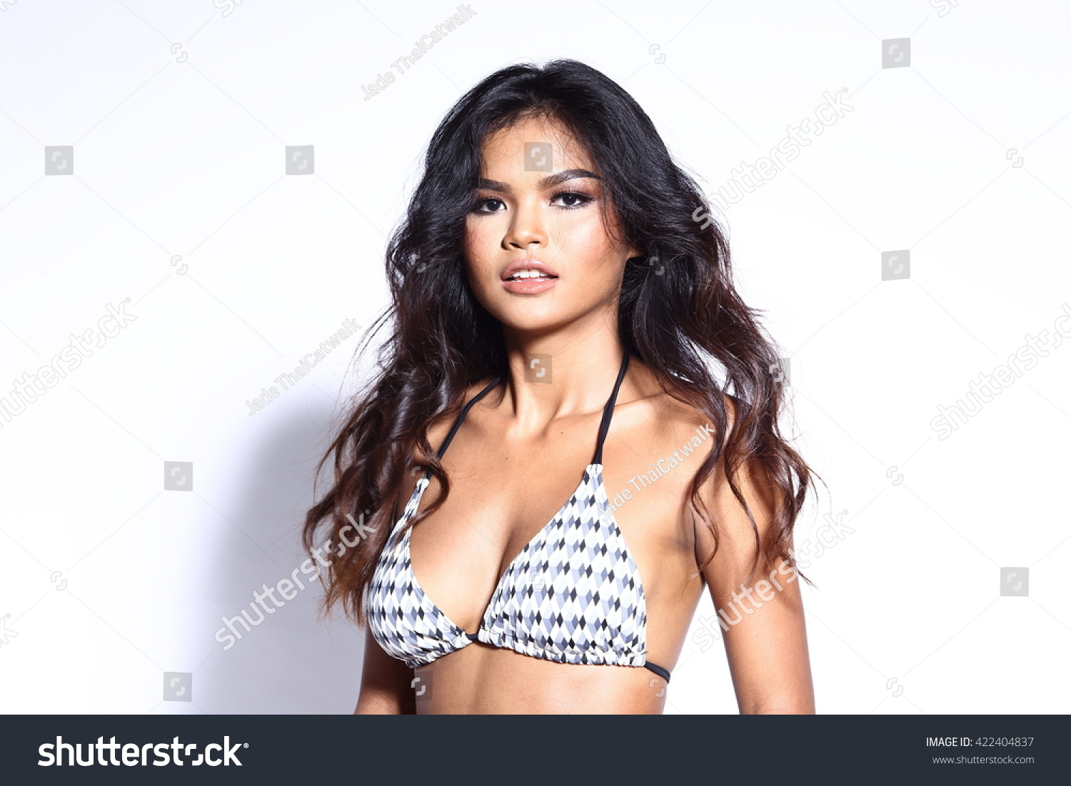 https://image.shutterstock.com/z/stock-photo-beautiful-asian-thai-model-woman-in-tan-skin-black-white-pattern-sport-swim-suit-fashion-make-up-on-422404837.jpg
