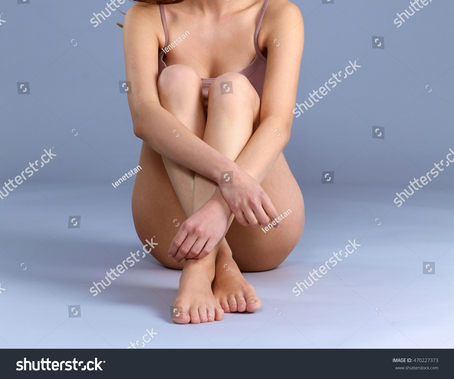 Beautiful Barefoot Woman Sitting On Floor Stock Photo 470227373