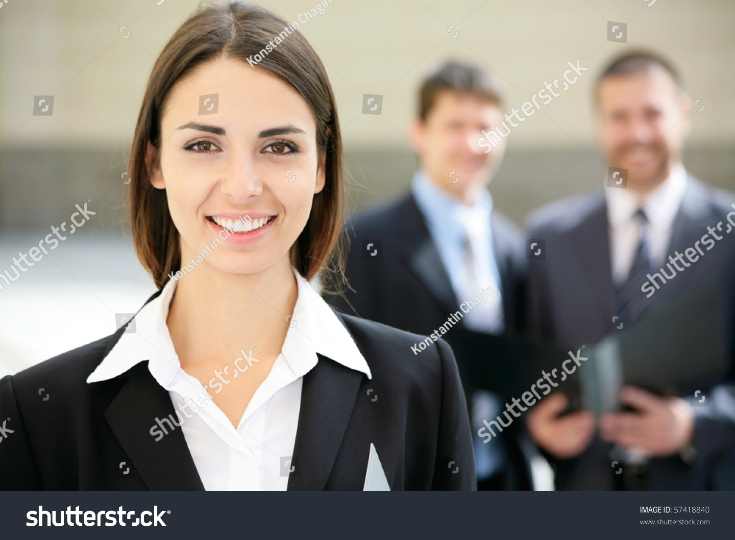 Beautiful Businesswoman On The Background Of Business People Stock ...