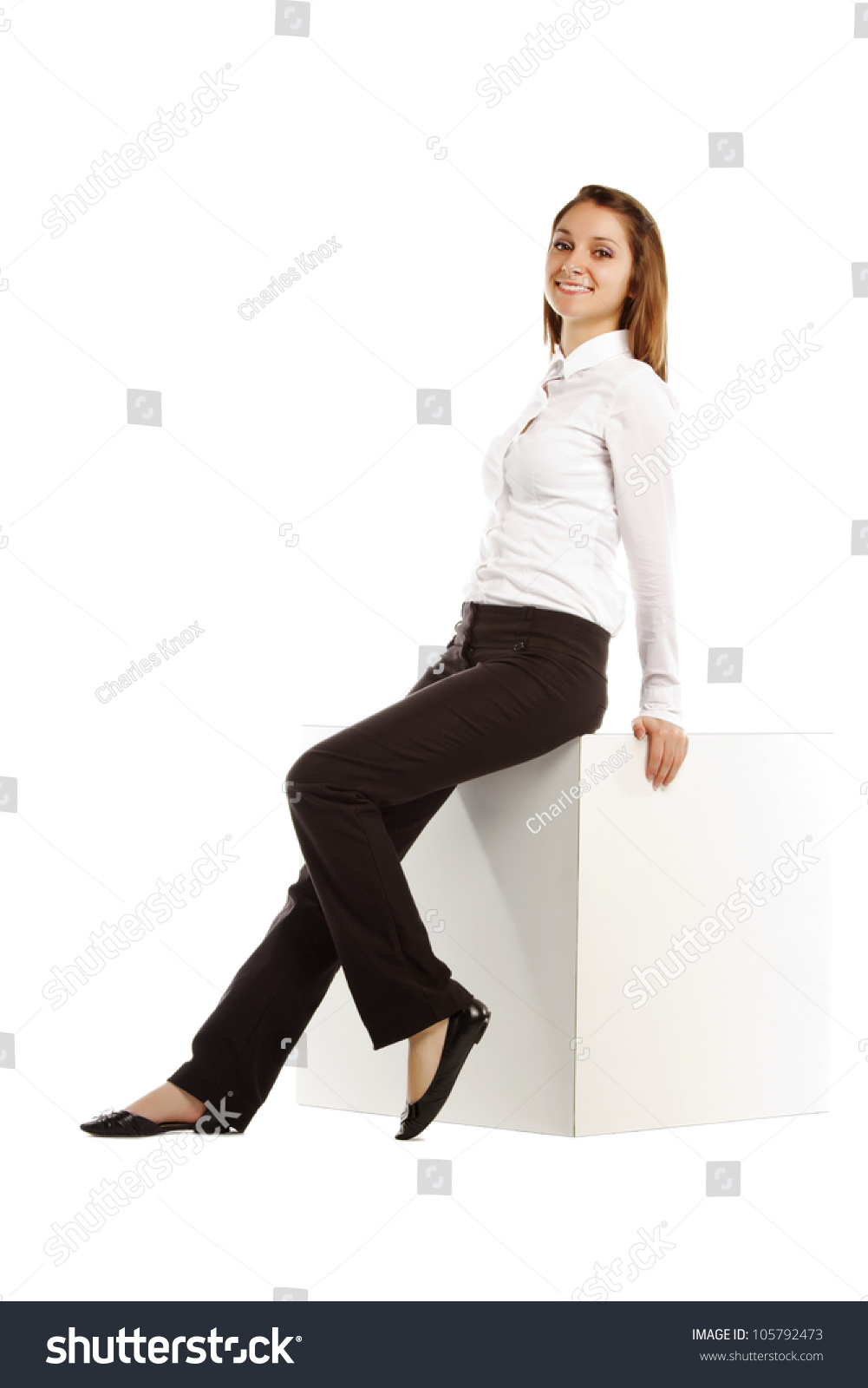 Beautiful Caucasian Business Woman Sitting On White Block Stock Photo ...