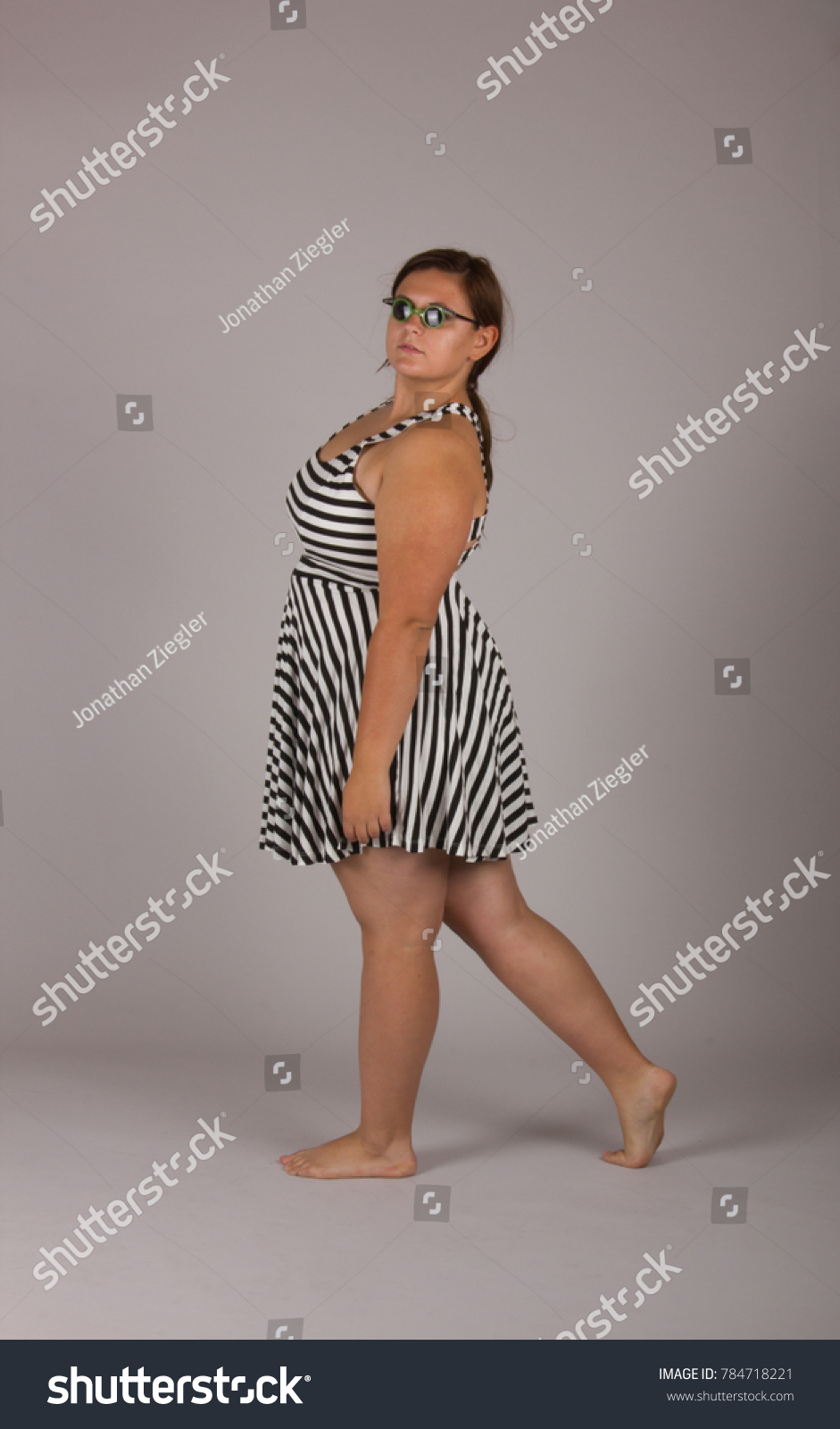 curvy girl with glasses dressing