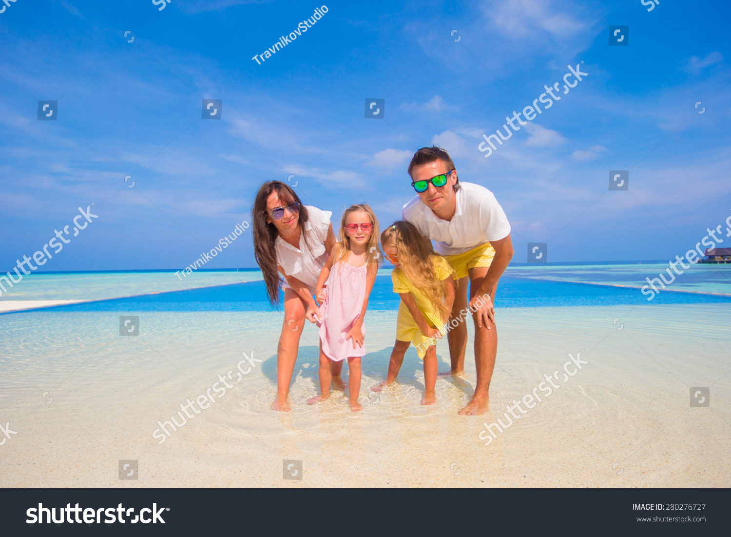 Beautiful Family During Summer Tropical Vacation Stock 