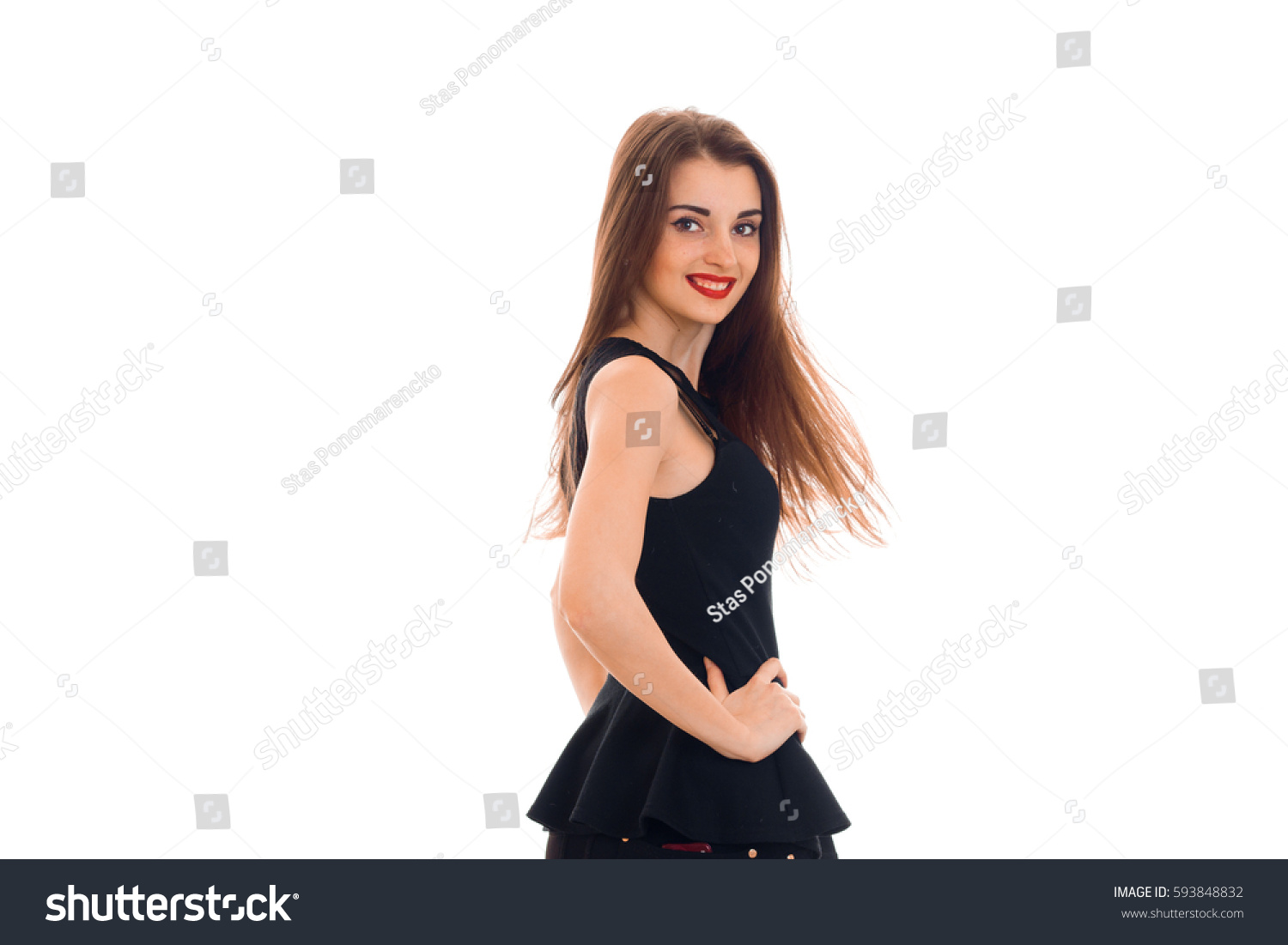 Beautiful Girl In Black Dress Is Worth Turning Sideways To The Camera Smiling And Keeping Her Beautiful Girl In Black Dress Is Worth Turning Sideways To The Camera Smiling And Keeping Her