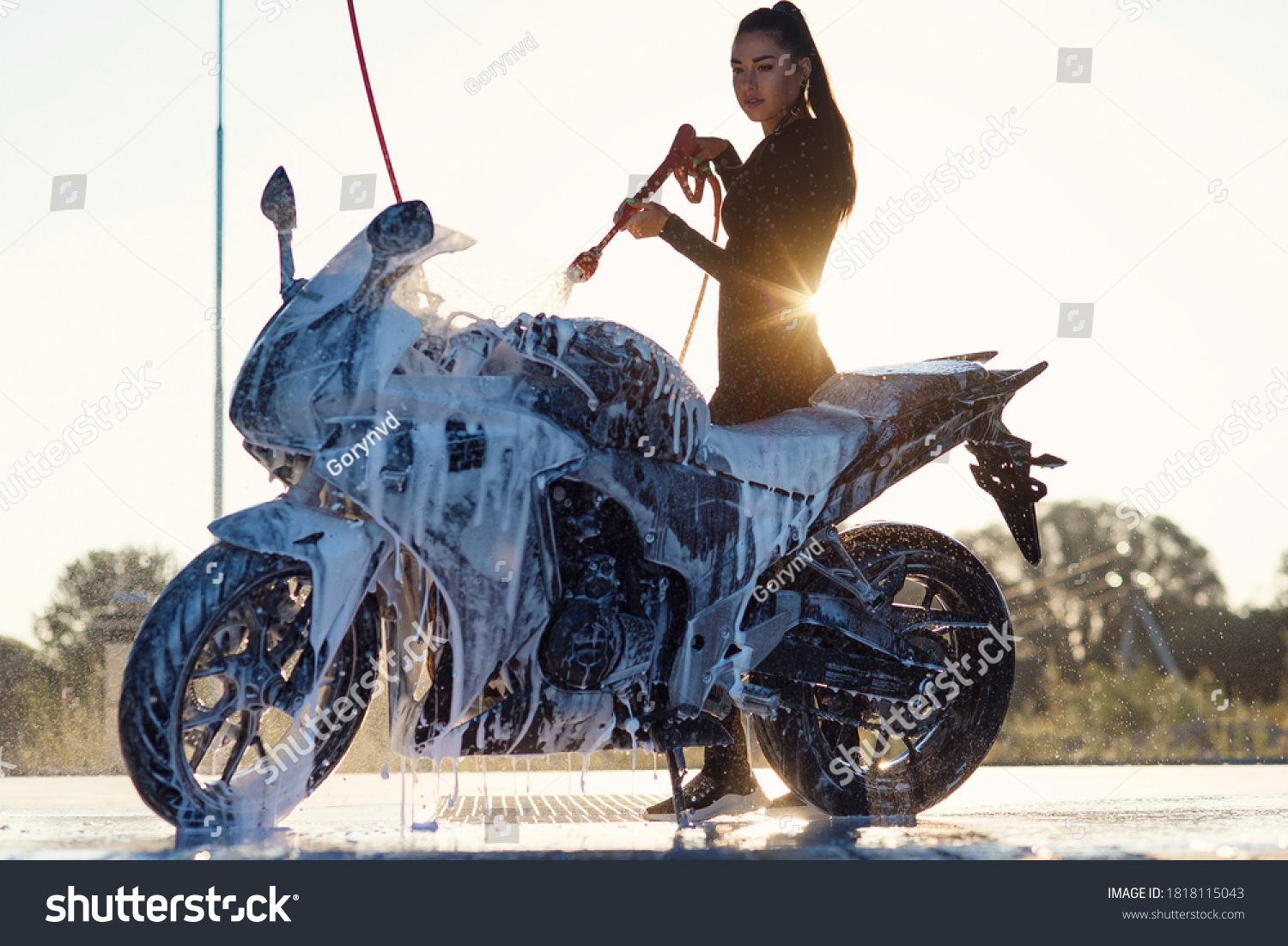 299 Girl washing motorcycle Stock Photos, Images & Photography