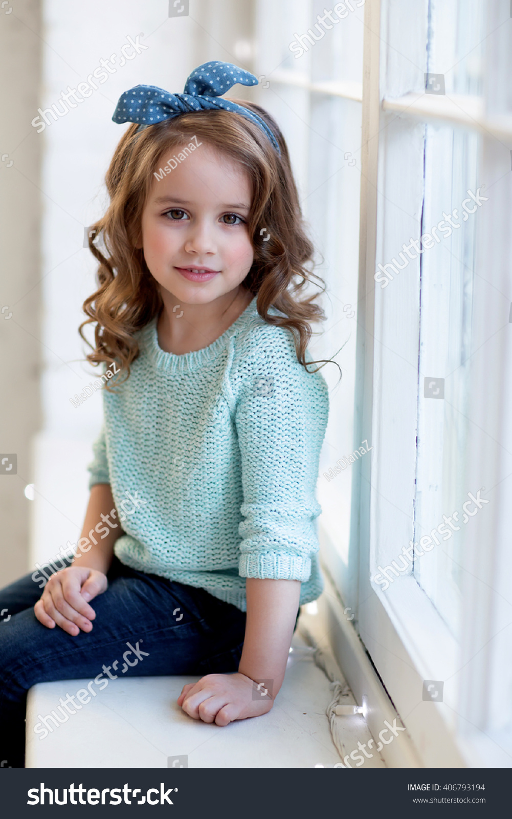 Beautiful Girl Curly Hair Sits On Stock Photo 406793194 - Shutterstock