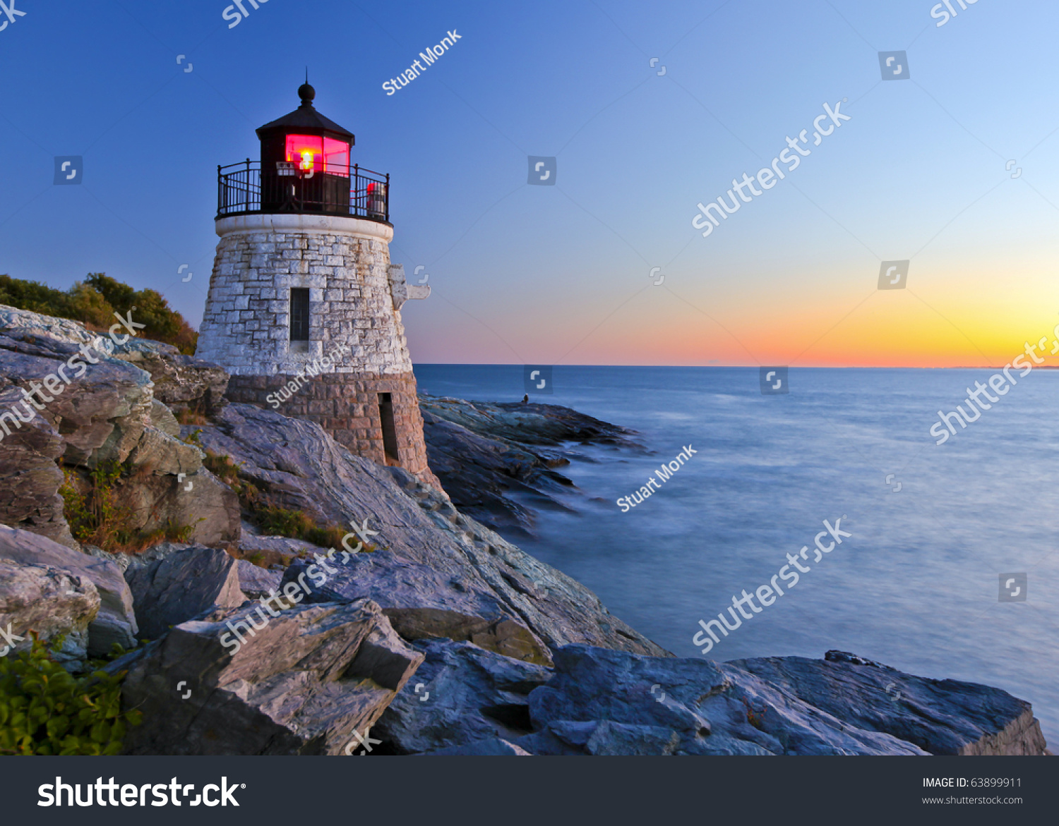 Beautiful Lighthouse By The Ocean At Sunset Stock Photo 63899911 ...