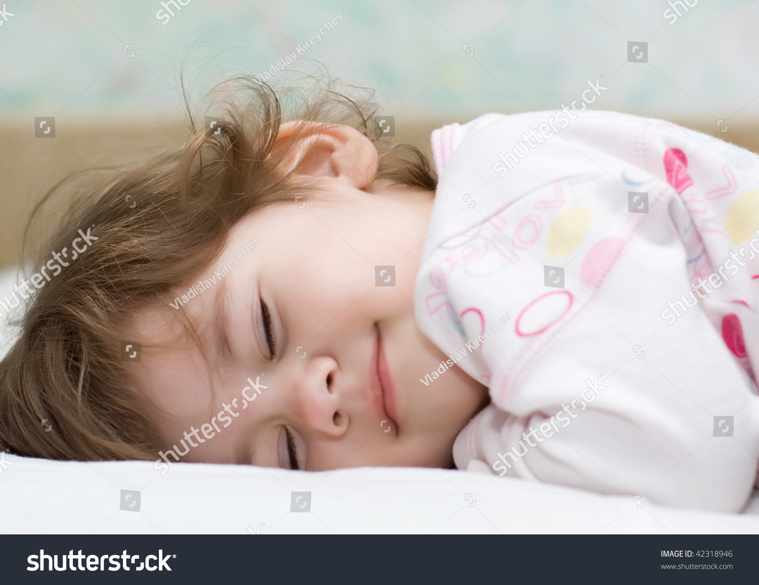 Beautiful Little Girl With Closed Eyes Lying In Bed And Smile Stock ...