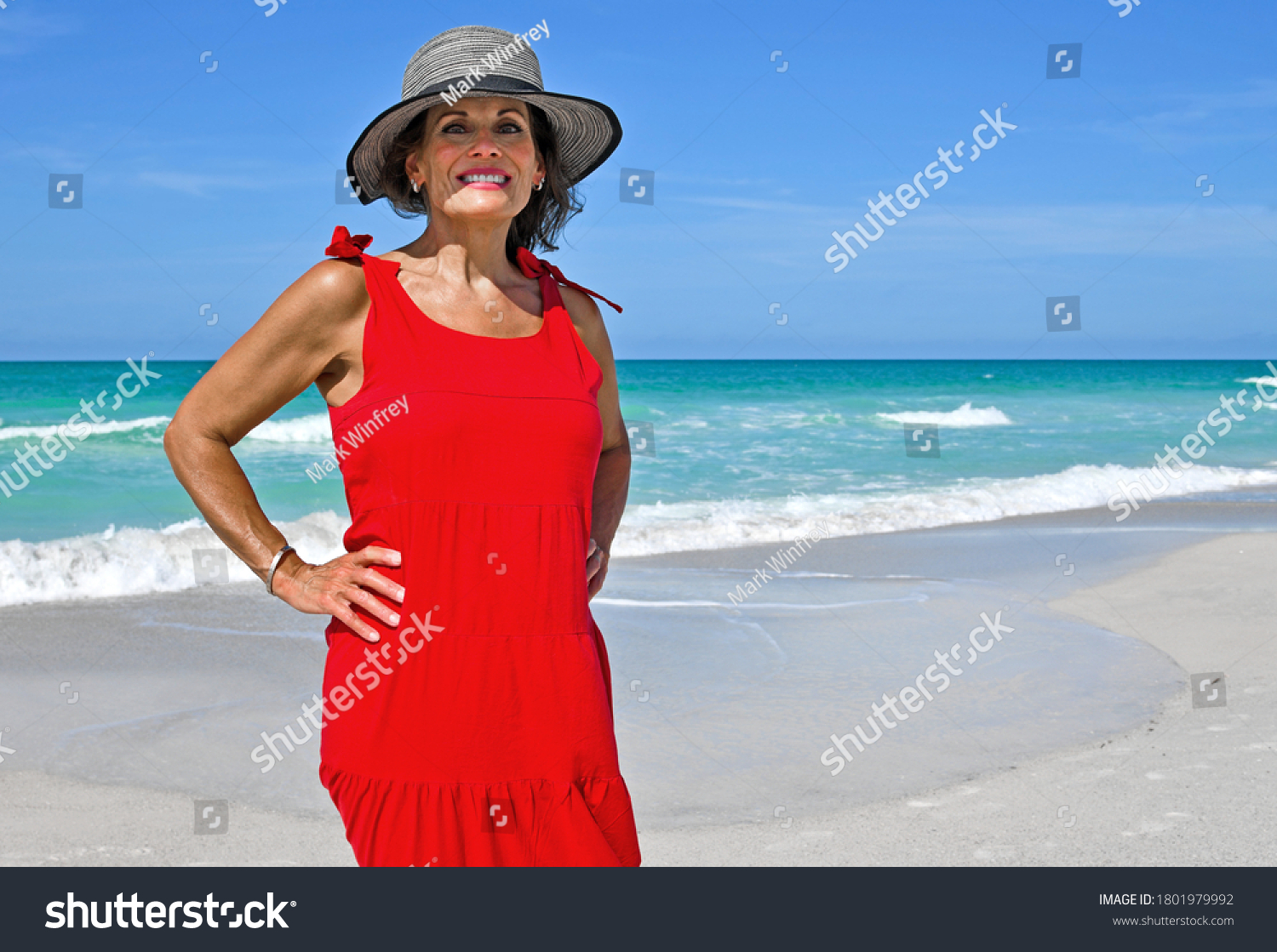 Sexy Older Brunette Woman Stock Photos Images Photography Shutterstock Stock Photo Beautiful Mature Woman Wearing A Red Summer Dress On The Beach 1801979992
