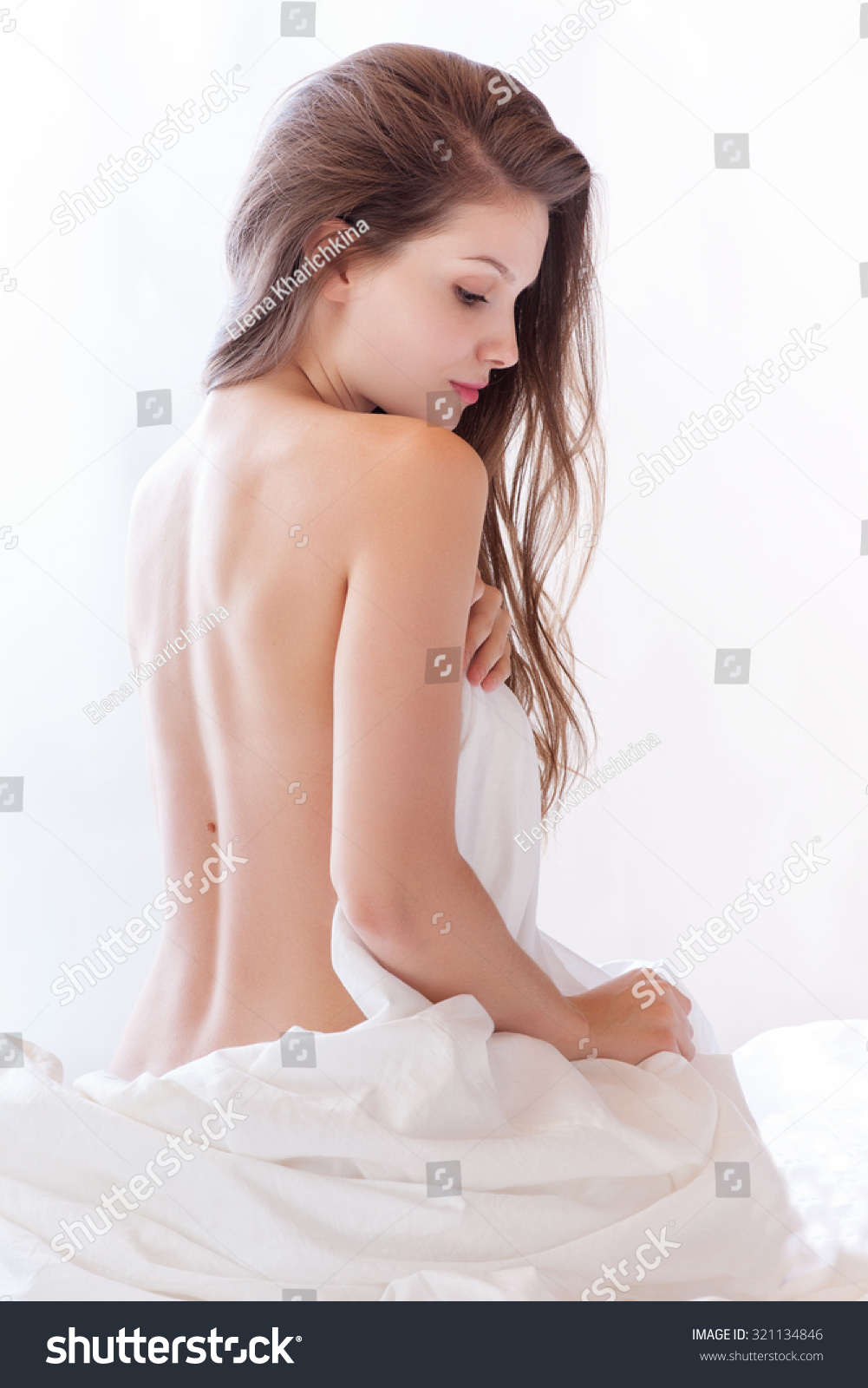naked girl in sheet