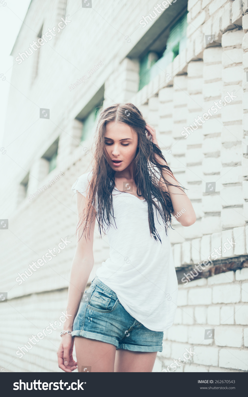 Beautiful Sexy Brunette With Wet Hair On A Hot Day Stock Photo ...