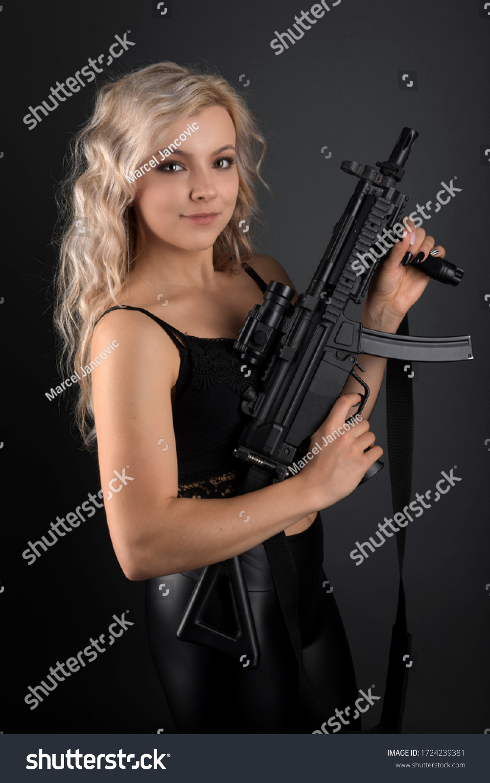 Beautiful Sexy Girl Holding Gun Foto Stok 1724239381 Shutterstock 4145
