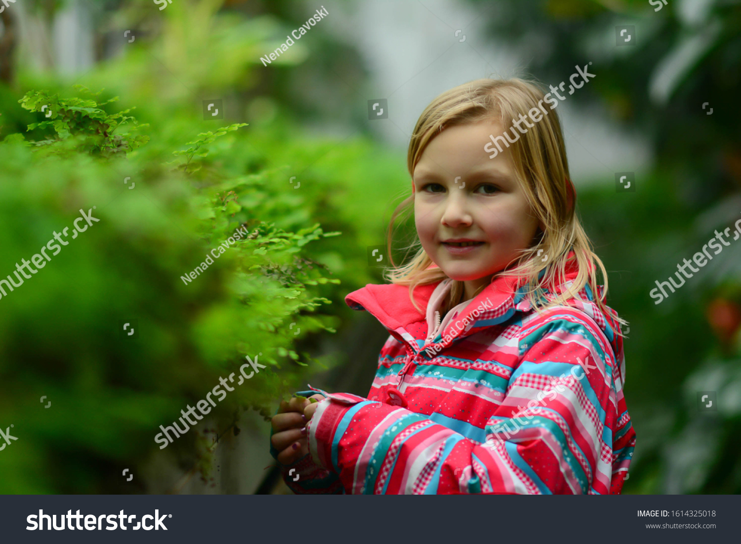 Beautiful Smiling Cute Preschool Girl Greenhouse Royalty Free