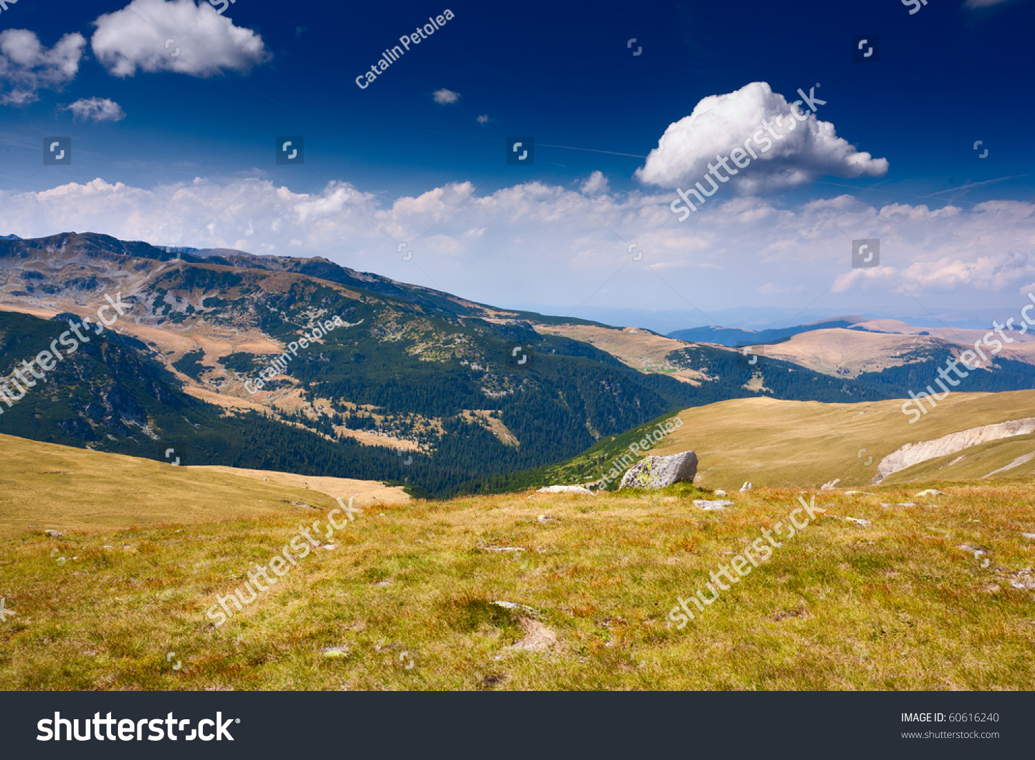 Beautiful Vibrant Landscape With Mountains, Clouds And Sky Stock Photo ...