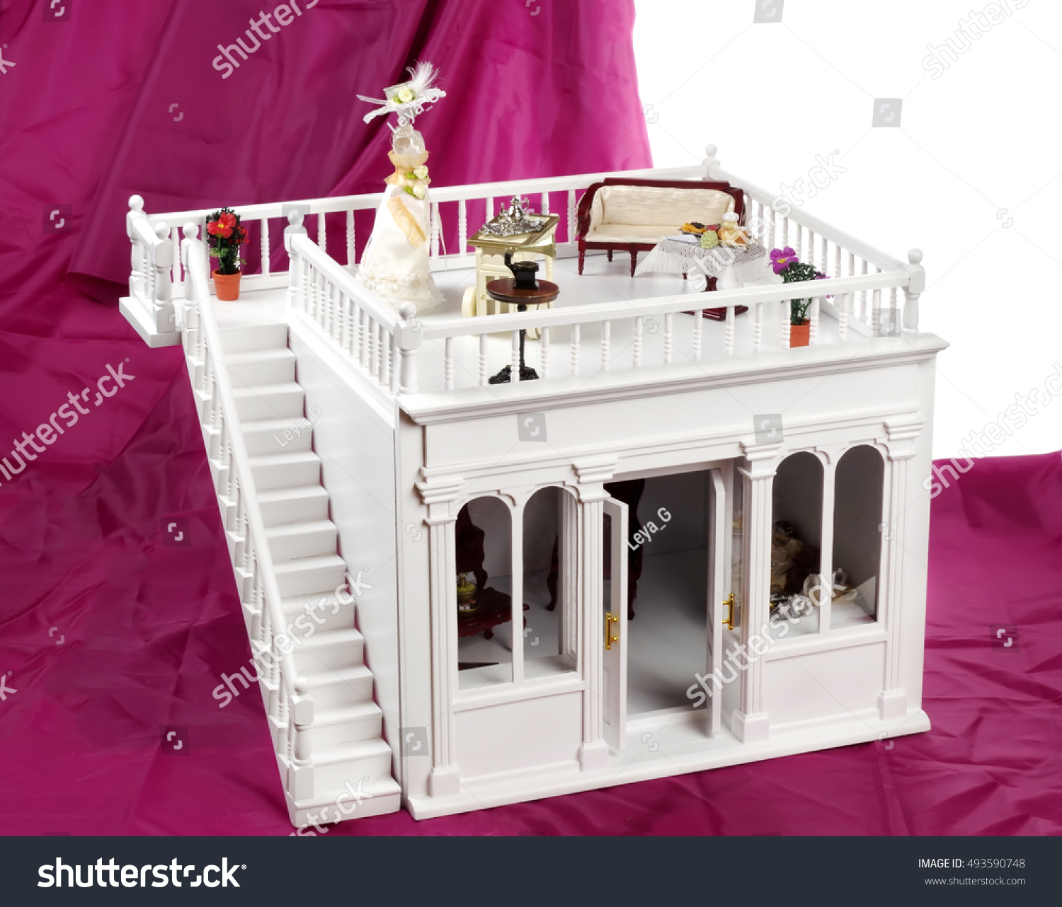white dolls house