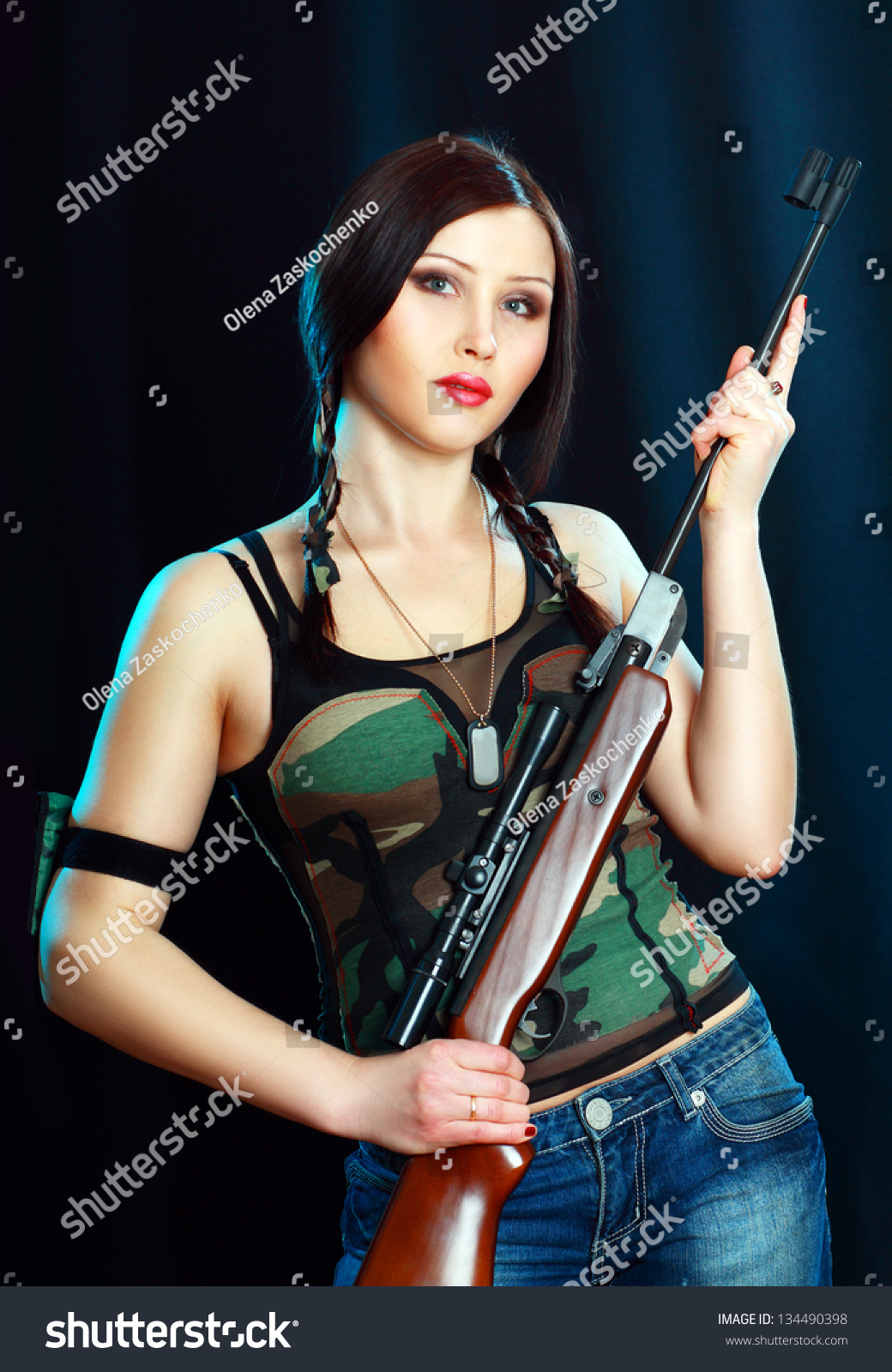 Beautiful Woman Holding Weapon Weared Camo Over Dark Background Stock ...