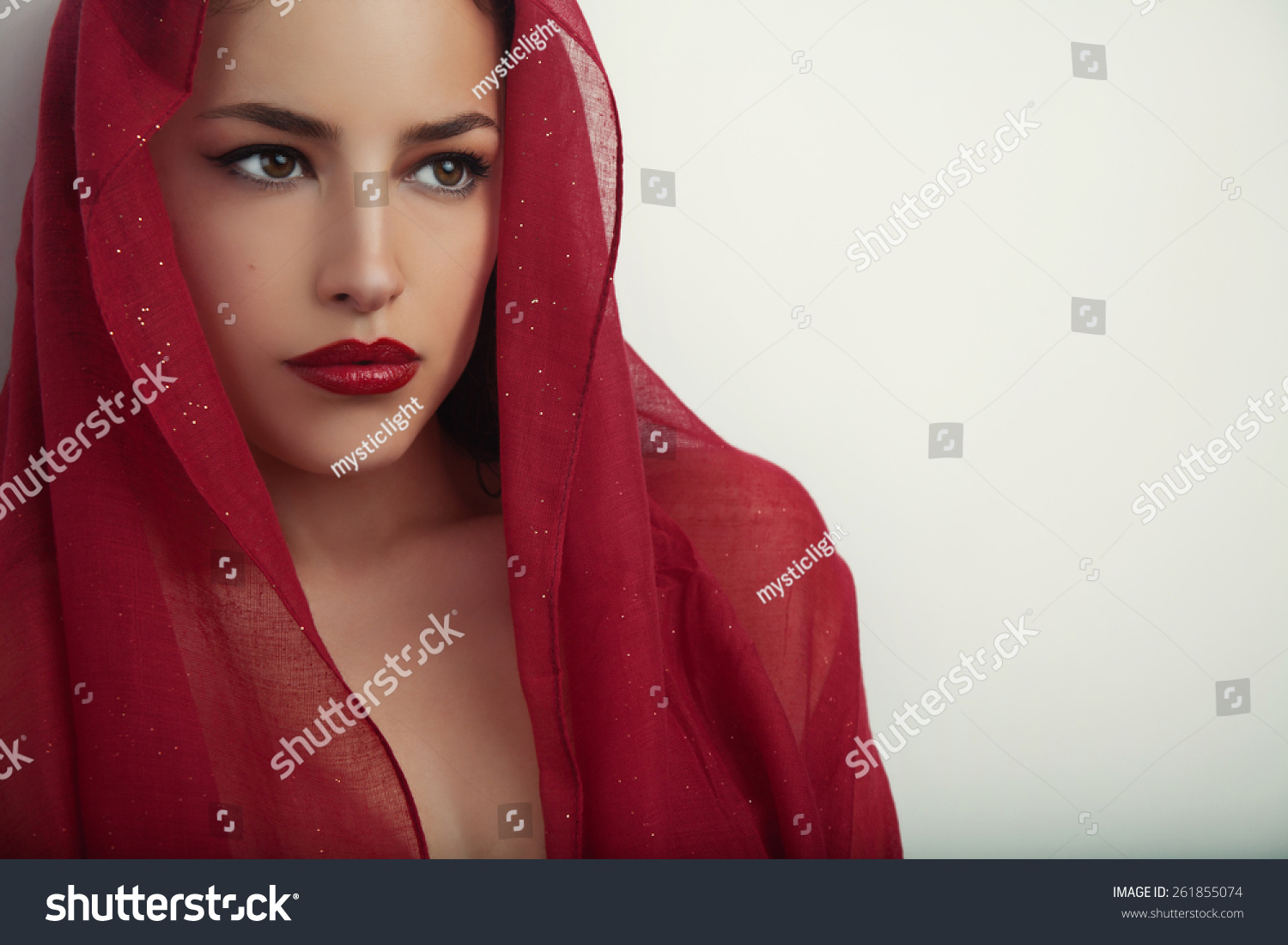 Beautiful Woman Portrait With Red Lips And Red Veil Over Her Head ...
