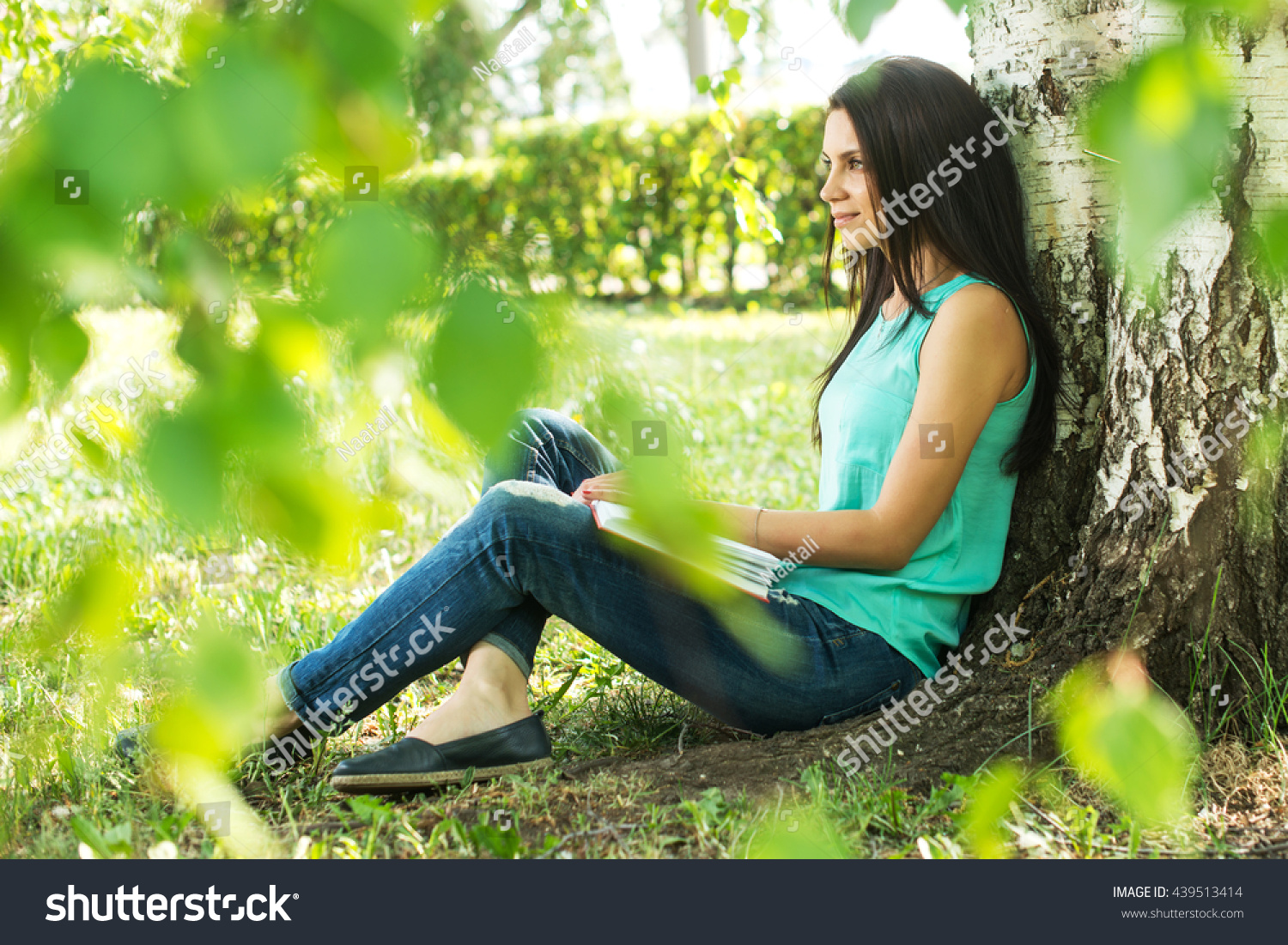 Beautiful Woman Relaxing Outdoors On Grass Stock Photo 439513414 