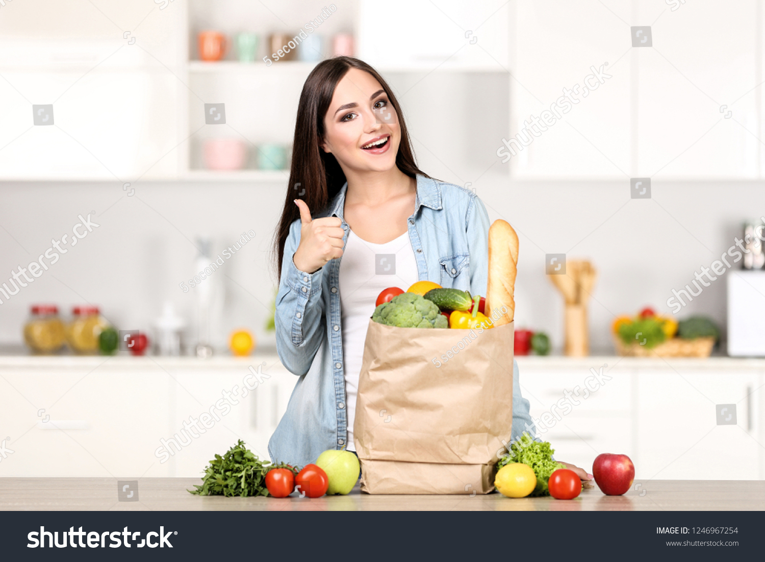 Beautiful Woman Standing On Kitchen Grocery Stock Photo 1246967254 ...