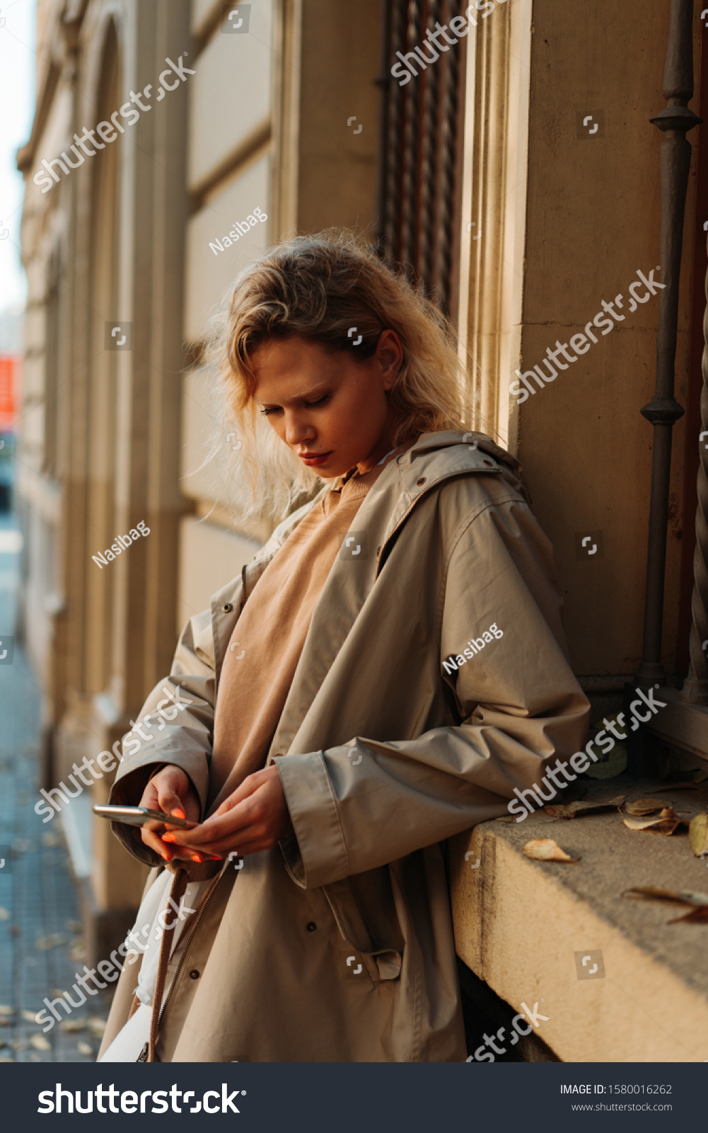 trench coat with writing