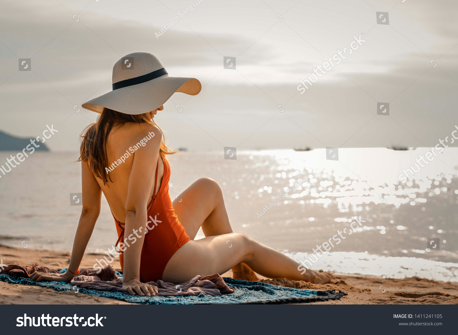 Beautiful Women Wearing Bikini Sitting On Stock Photo 1411241105