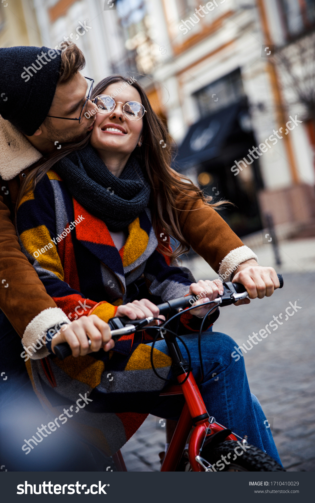 D Cor Sculptures Figurines Home Garden Kissing Couple W Bike   Stock Photo Beautiful Young Couple Riding A Bike In The City And A Woman Smiling While Getting A Kiss 1710410029 