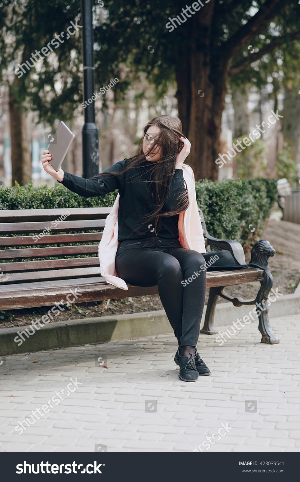 Beautiful Young Model Sitting On Bench Stock Photo 423039541 - Shutterstock