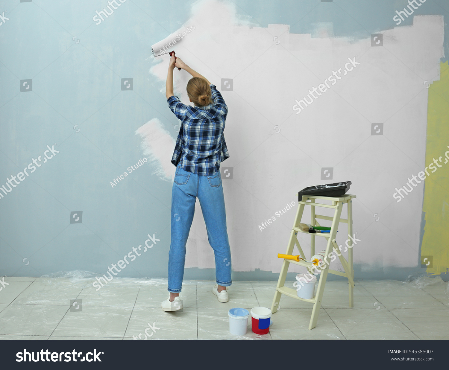 Beautiful Young Woman Painting Wall Room Stock Photo 545385007 Beautiful Young Woman Painting Wall Room Stock Photo 545385007
