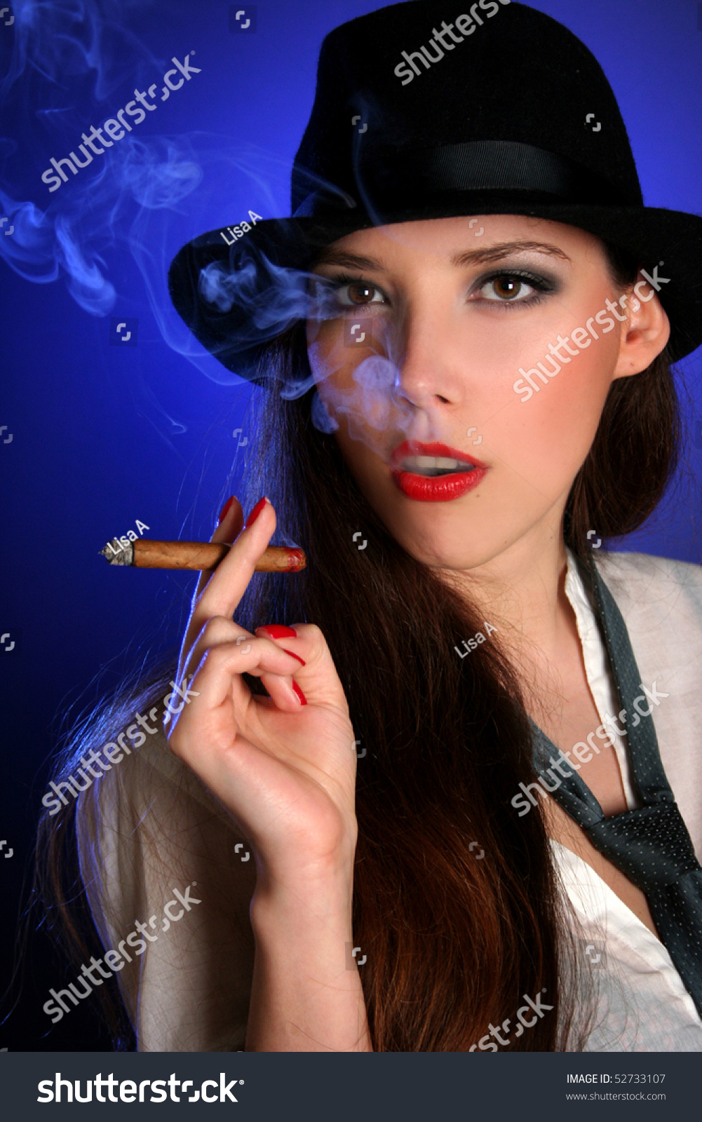 Beautiful Young Woman Smoking Cigar Stock Photo 52733107 : Shutterstock