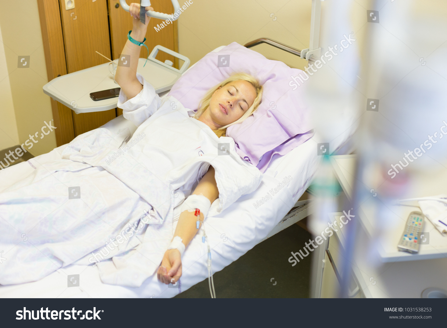 bedridden-female-patient-lying-hospital-bed-stock-photo-edit-now