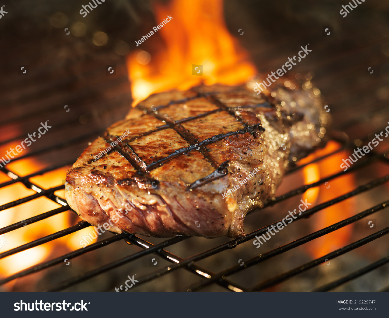 Beef Steak Cooking Over Flaming Grill Stock Photo 219229747 - Shutterstock