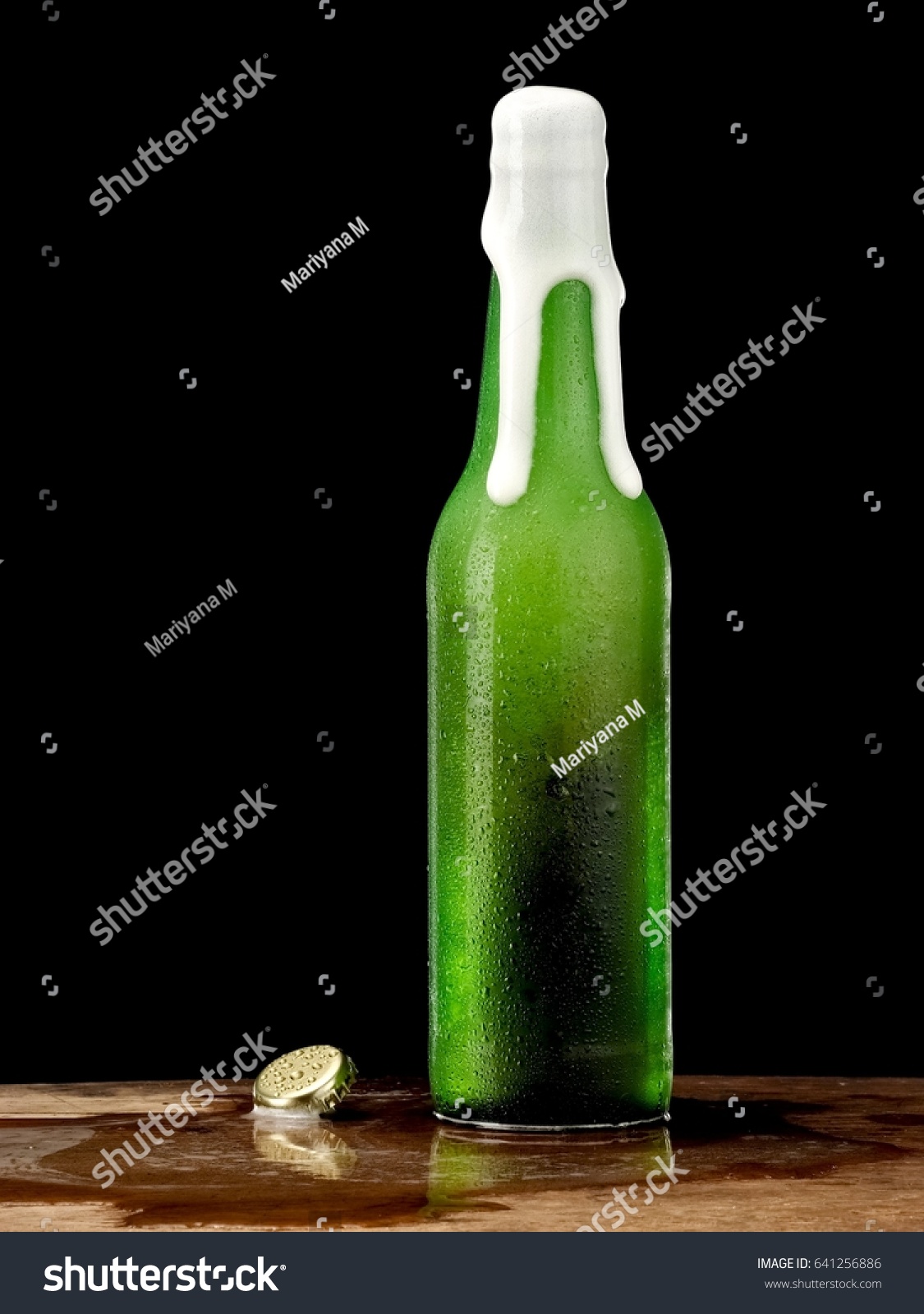 Download Beer Foam Overflow Green Bottle Drops Stock Photo Edit Now 641256886 Yellowimages Mockups
