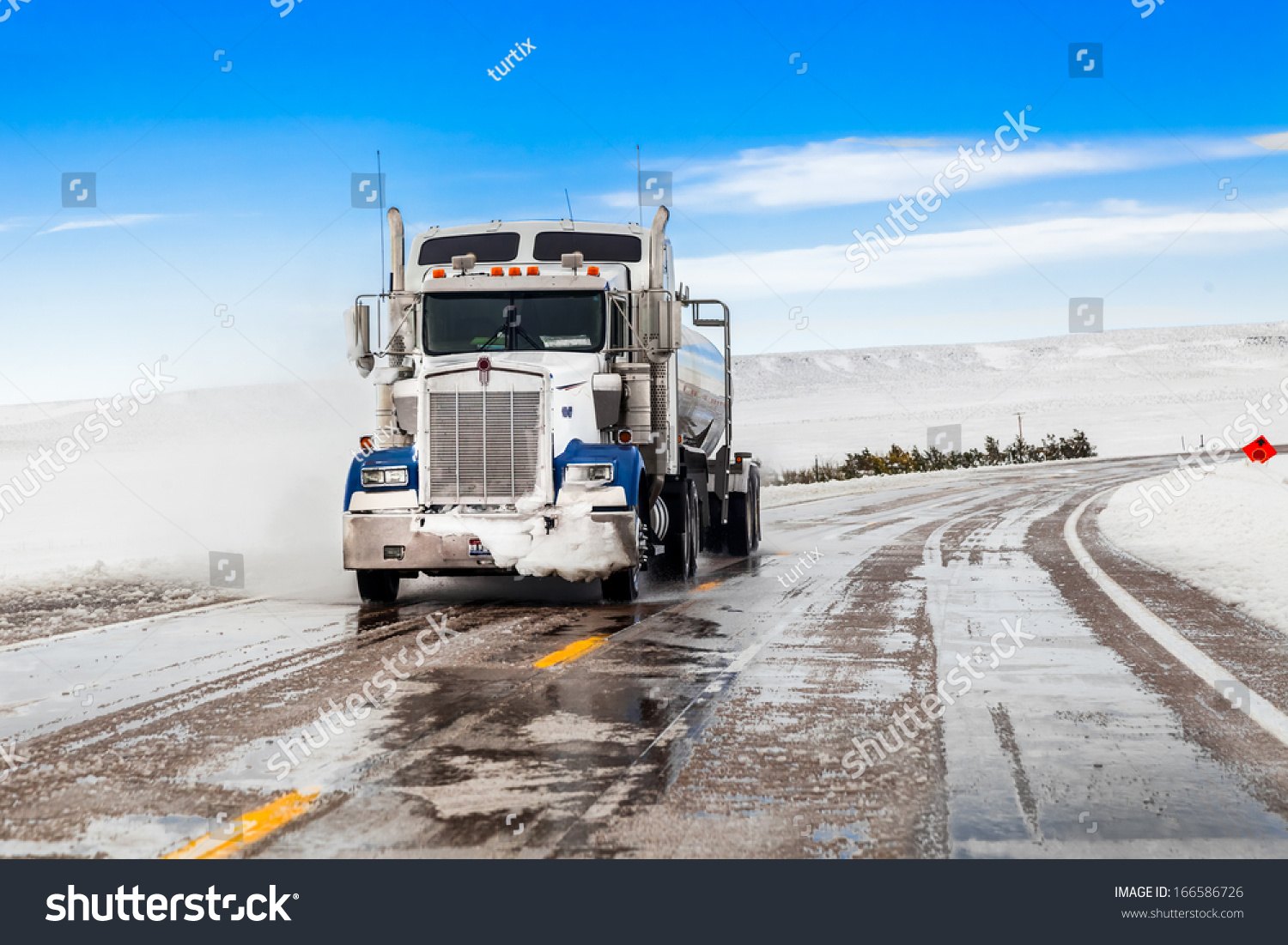 Big Truck Drives On Snow Highway Stock Photo 166586726 : Shutterstock