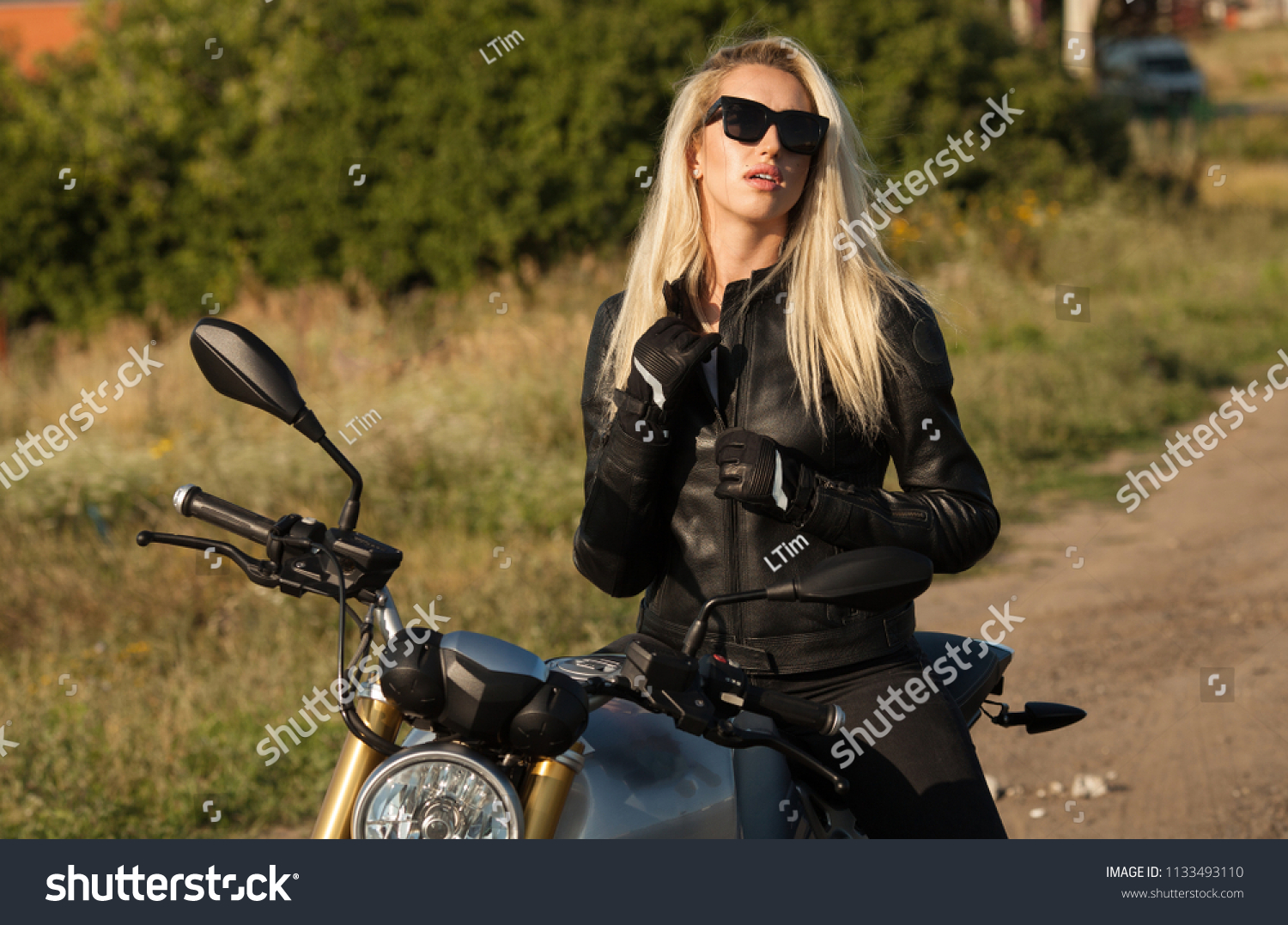 Biker Girl Leather Jacket On Motorcycle Stock Photo Edit Now 1133493110