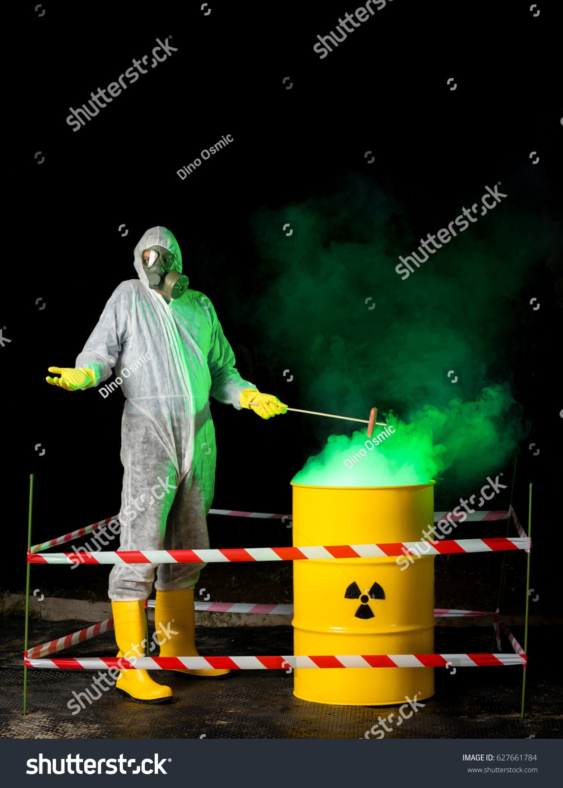 Download Biohazard Worker Grilling Sausage Over Radioactive People Stock Image 627661784 PSD Mockup Templates