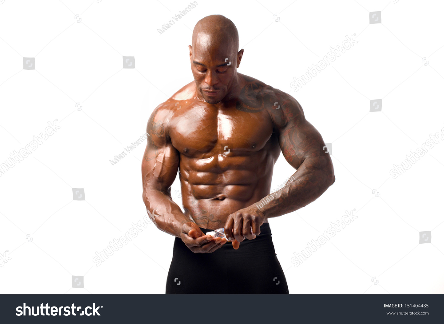 Black Bodybuilder Pouring Oil On His Stock Photo (Edit Now) 151404485