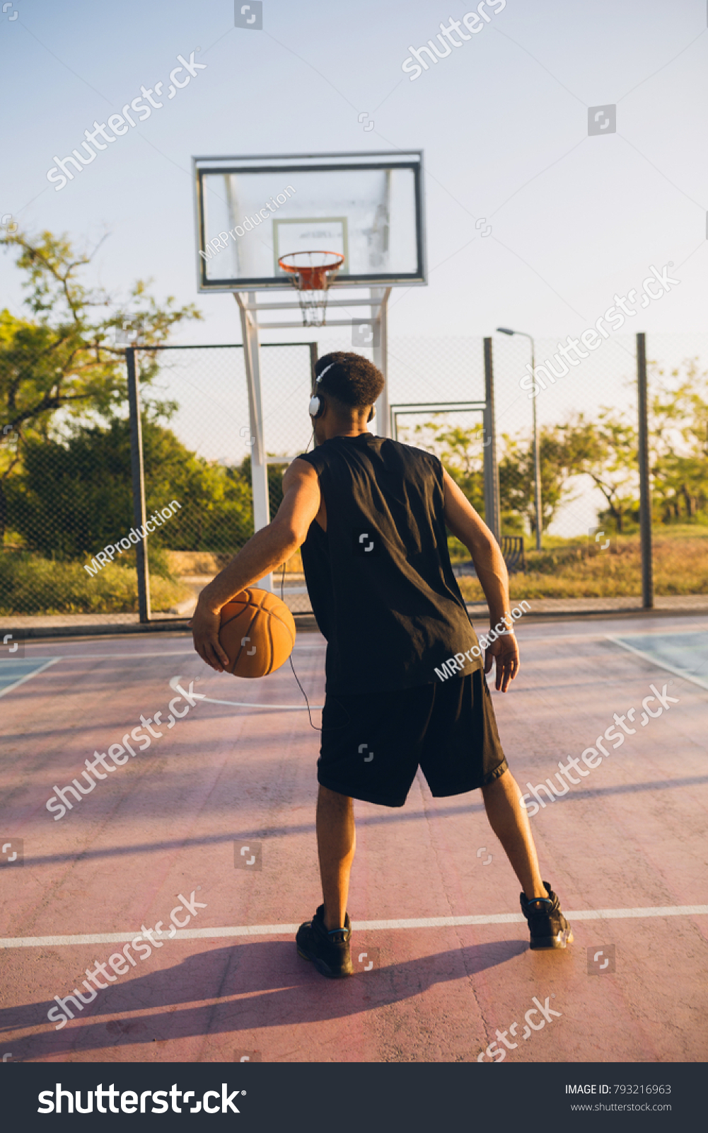 man playing basketball