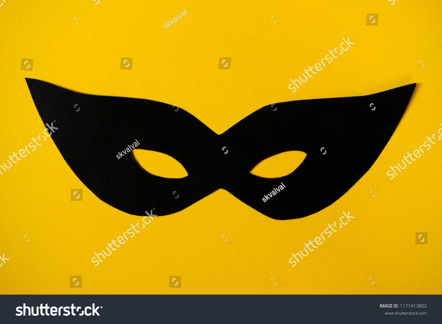 Download Black Paper Mask On Yellow Background Stock Photo Edit Now 1171413802 PSD Mockup Templates