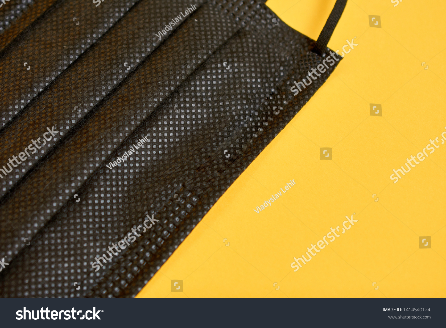 Download Black Surgical Mask On Yellow Background Healthcare Medical Stock Image 1414540124 PSD Mockup Templates