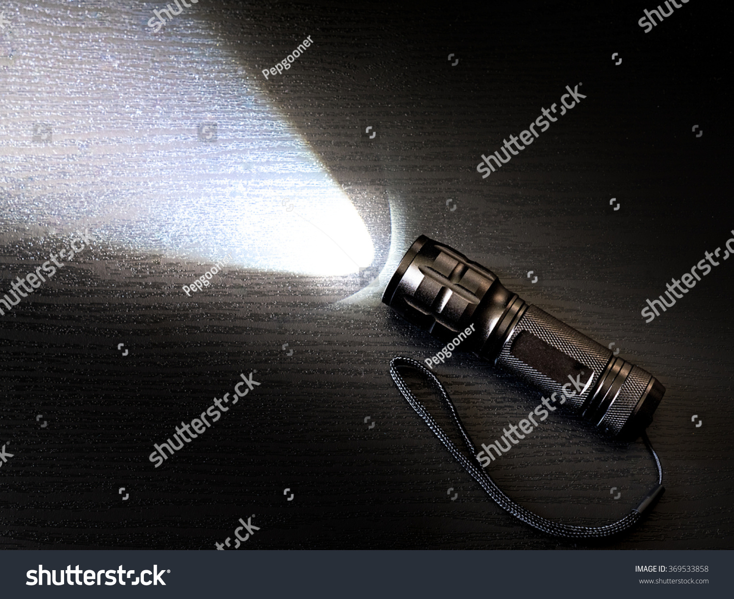 Black Torch Or Flashlight With Beam Of Light. Stock Photo 369533858 ...