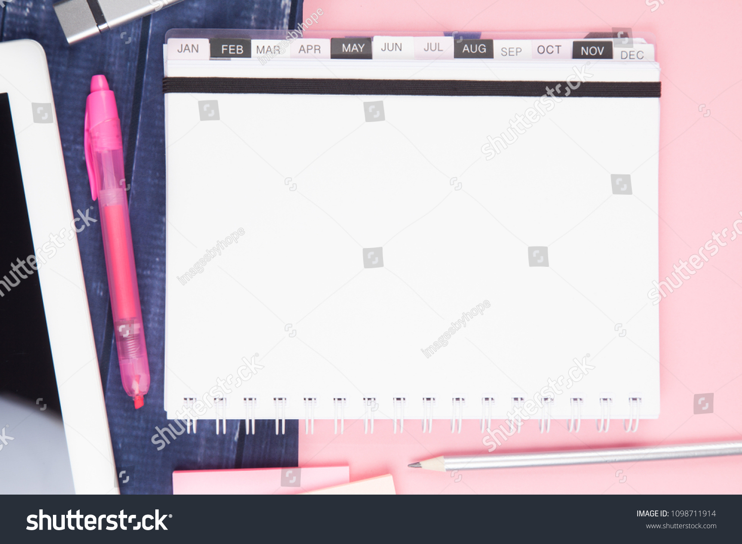 Blank Calendar On Wood Desk Overhead Stock Photo Edit Now 1098711914