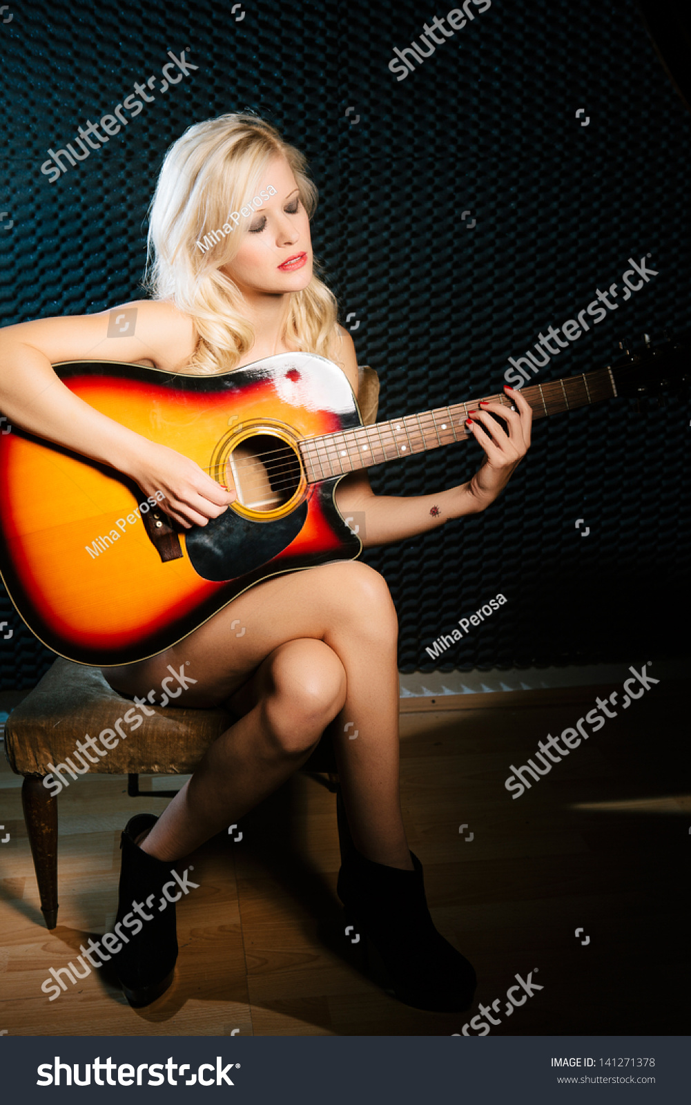 Naked Blonde Girls Holding Guitar